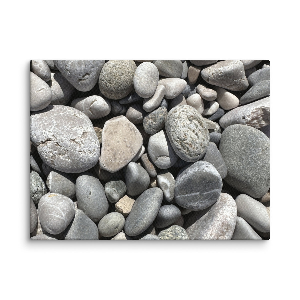 Smooth beach pebbles at Plage du Casino, Menton, France — canvas print