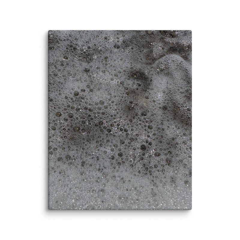 Sea foam on pebble beach at Plage du Casino, Menton, France — canvas print